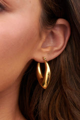 Sun Drop Oval Huggie Earrings Gold