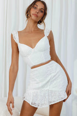 Quincy Flounce Hem Floral Embroidery Mini Skirt White